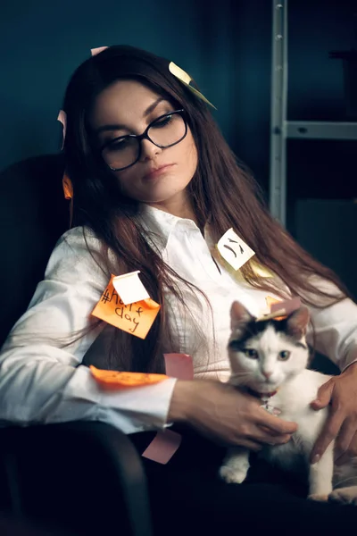 Woman with stickers all over her holding cat. — Stock Photo, Image