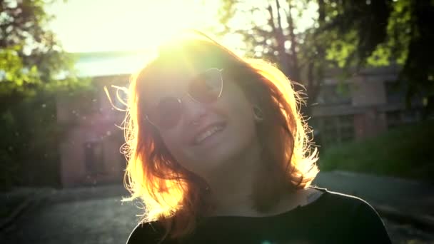 Portrait of ginger girl with sunglasses. — Stock Video