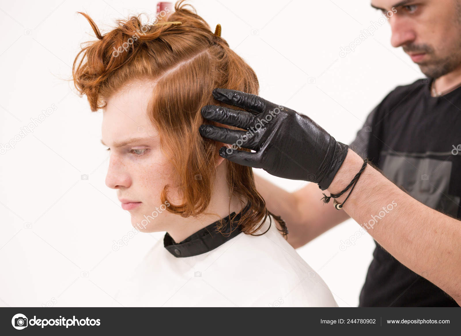 Barber Pinning A Hair Of His Client With A Hairpin Stock Photo