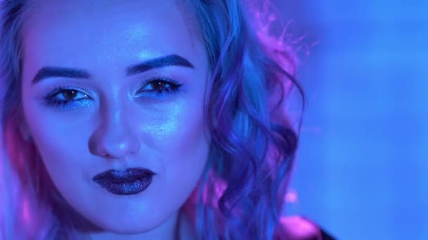 Young Blond Model is Posing in Neon — Stock Video