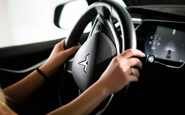 Tesla New-generation Electric Car of Dark Brown Indoor — Stock Photo, Image