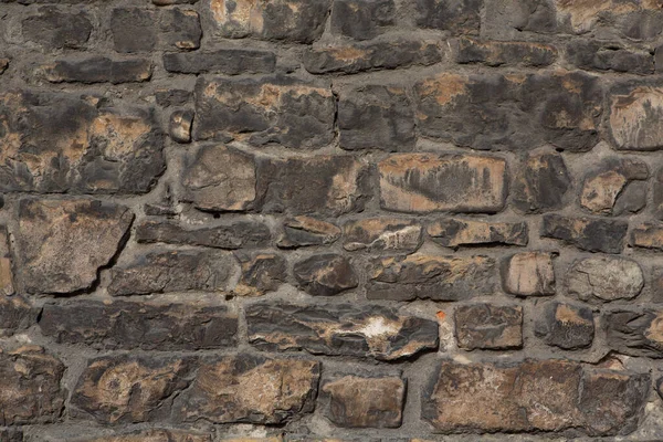 Taş duvar. Masonluk ya da antika bir tuğla. Doku veya arkaplan — Stok fotoğraf