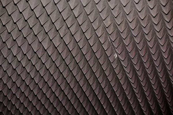 Dark gray diamond-shaped soundproofing. Soundproof coating or slab texture. Abstract geometric texture or background — Stock Photo, Image