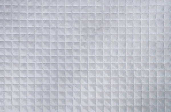 Textura xadrez tecido branco com malha em relevo. Padrão abstrato, fundo ou textura — Fotografia de Stock