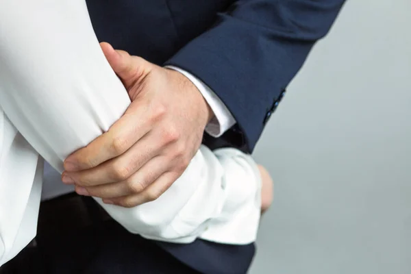 Caucasian business people, man and woman touch and hug each other. Love affair at office workplace concept. Close up of human hands in motion — Stock Photo, Image