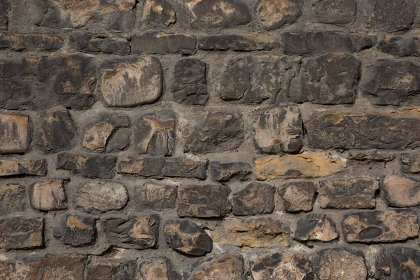 Ancient stone wall. Brawn weathered brick background or texture — Stock Photo, Image