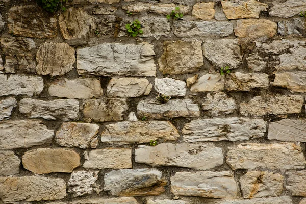 Beyaz taştan eski bir duvar. Tuğla duvar arkaplan resmi. Yüksek kalite fotoğraf — Stok fotoğraf
