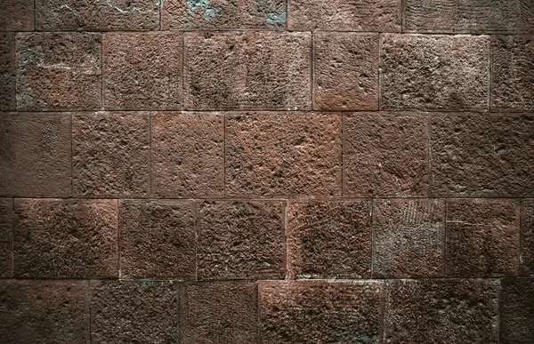 Dark porous brick. Background image. Ancient brick stone wall. High quality photo — Stock Photo, Image