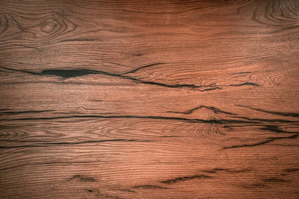 Placa de madeira com fendas escuras close-up. Imagem de fundo do revestimento de madeira. Foto de alta qualidade — Fotografia de Stock