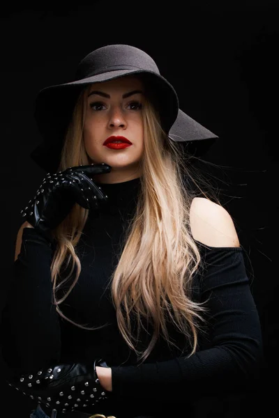 Portrait of young blonde in hat , gloves — Stock Photo, Image