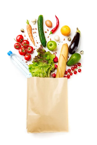 Foto de bolsa de papel con verduras, jugo, naranja, pan —  Fotos de Stock