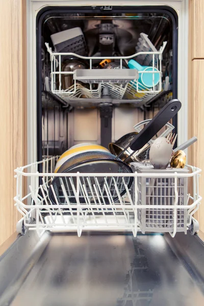 Photo of open dishwasher with dirty dishes — Stock Photo, Image