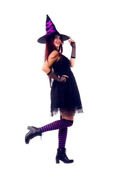 검은 드레스와 모자에 갈색 머리 마녀의 그림 — 스톡 사진