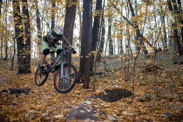 Photo of man riding sports bike on track