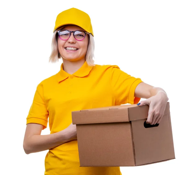 Picture of young blonde courier in yellow T-shirt on white clean background — Stock Photo, Image