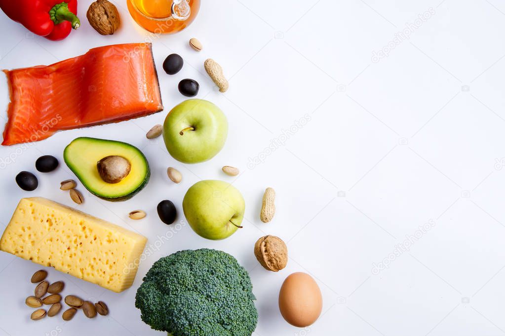 Photo of useful products for diet on white empty table.