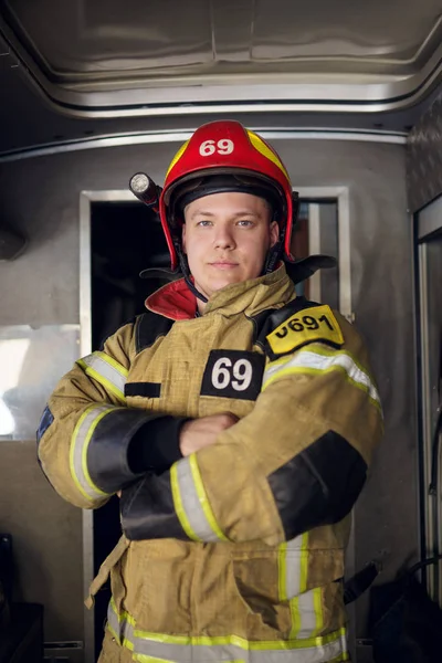 Image of man fireman on background of fire truck — Stock Photo, Image