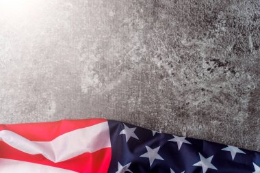 American flag in front of grey background clipart