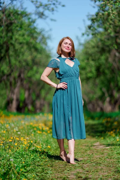 Full-length photo of happy woman in long dress — Stock Photo, Image