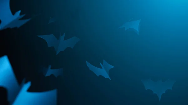 Halloween picture of blue paper bats on blank dark blue background. — Stock Photo, Image