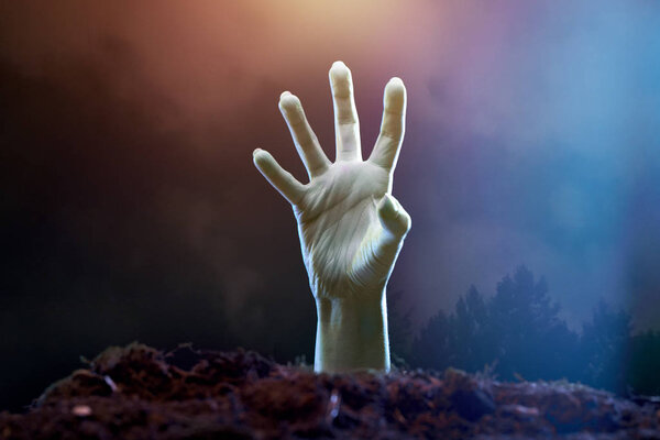 Image of zombie hand sticking out of grave
