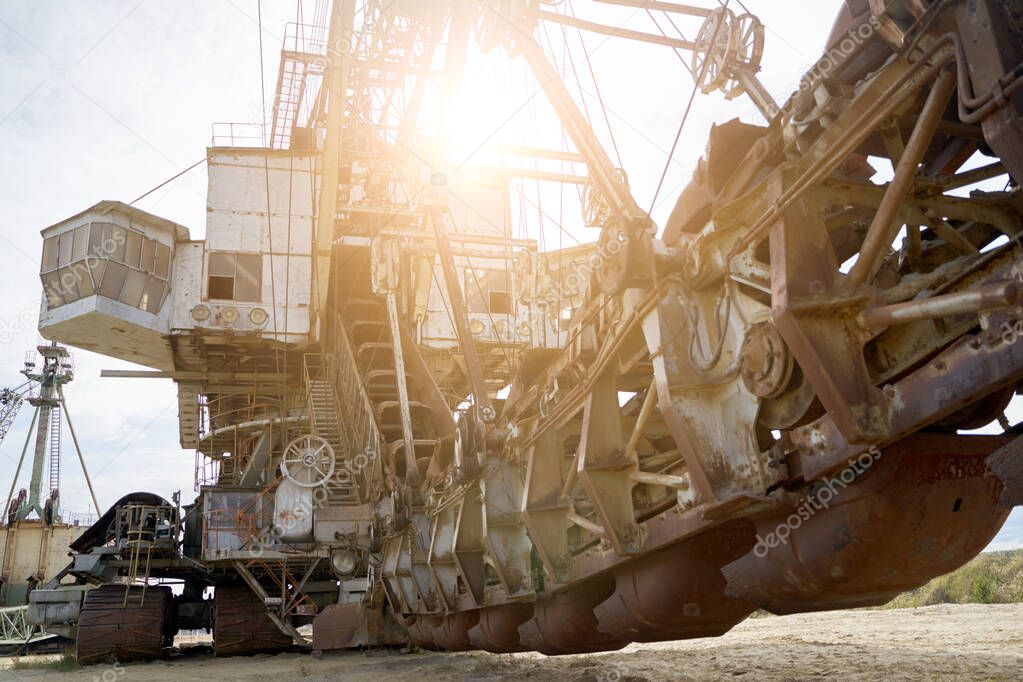 Close-up of excavator bucket outdoors on summer day