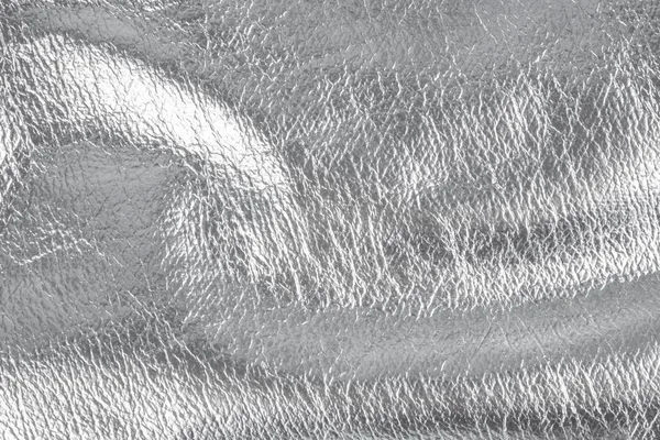 Фон с серебристым текстильным материалом, крупным планом - фото имаг Стоковое Изображение