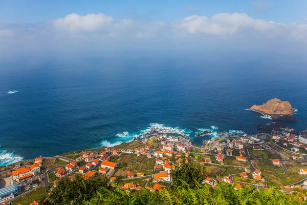 Concept of exotic and ecological tourism. Exotic island in the Atlantic Ocean - Madeira. The picturesque resort settlement on the ocean coast