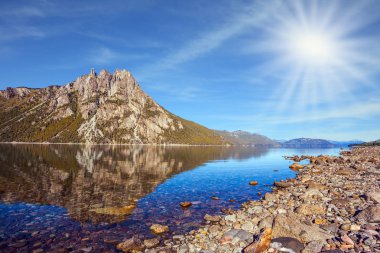 Picturesque mountain in Bariloche, Argentina. summer sun illuminates picturesque landscape   clipart