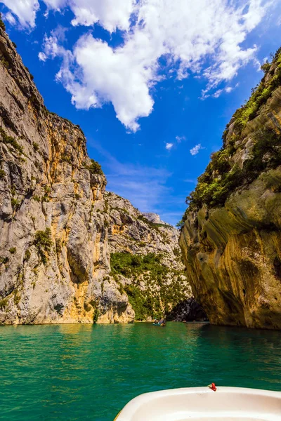 Walking by water bike along green waters of Verdon River in Mercantour Park, Provence Alps, France