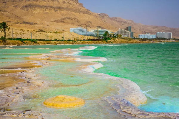 Forever Living Dead Sea. Healing salt in the drying-up Lake. Israel, spring. The concept of ecological and medical tourism