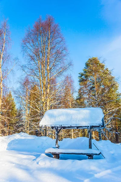 Bus stop in snow