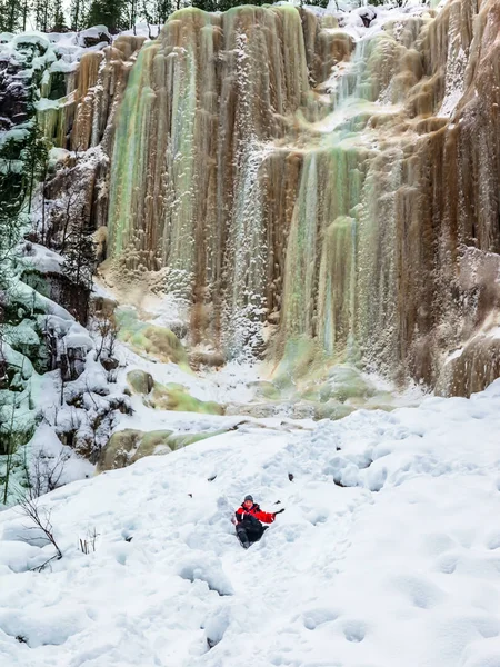 Happy hiker goes down in snow