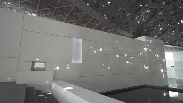 Interior of the new Louvre Museum in Abu Dhabi showing reflections of the Rain of Light dome stock footage video — Stock Footage Interior of the new Louvre Museum in Abu Dhabi showing reflections of the Rain of Light dome stock footage video Royalty Free Stock Video