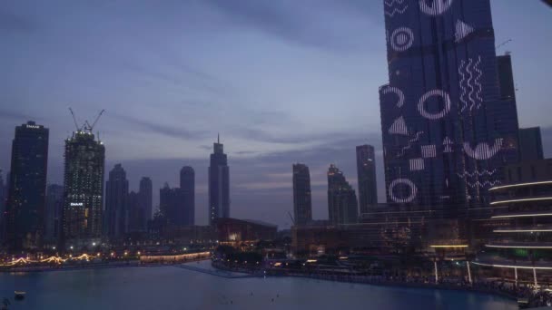 Aydınlatma günbatımı Stok görüntüleri video sonra Burj Khalifa'nın binasında lazer — Stok video