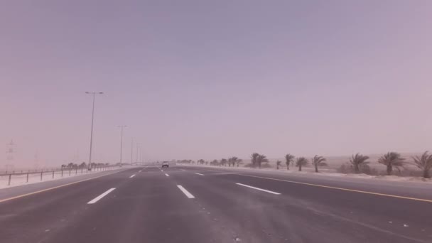 Sandstorm sweeps the sand on highway stock footage video — Stock Video