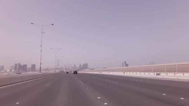 Road from the artificial islands to the Abu Dhabi stock footage video — Stock Video