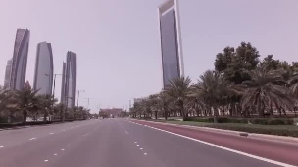 Car trip near the skyscrapers Etihad Towers in Abu Dhabi stock footage video — Stock Video