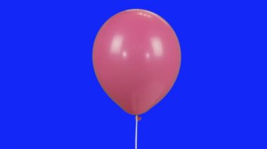 Bir mavi hromakey Stok görüntüleri video helyum ile pembe balon uçar