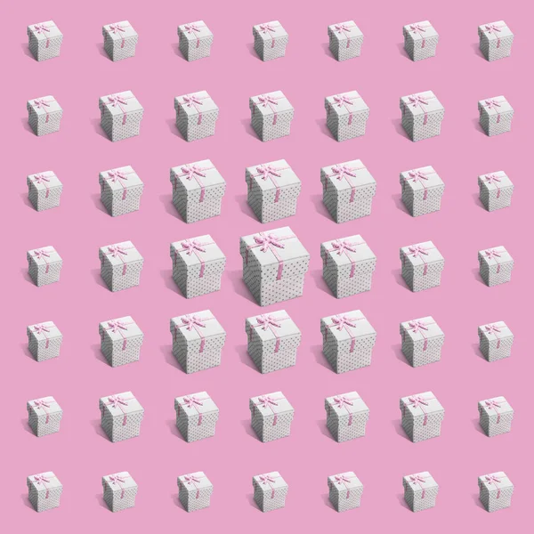 Foursquare pattern of gift paper boxes with gray dots wrapped with pink ribbon on pink background. Different size of boxes - The largest box in the center of image. Holiday and sale concept.