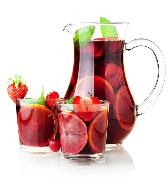 Cocktail collection - Refreshing fruit sangria in jug and two glasses. Isolated on white