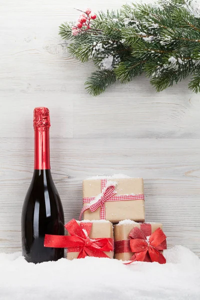 Christmas Gift Boxes Champagne Bottle Xmas Fir Tree Branch View — Stock Photo, Image