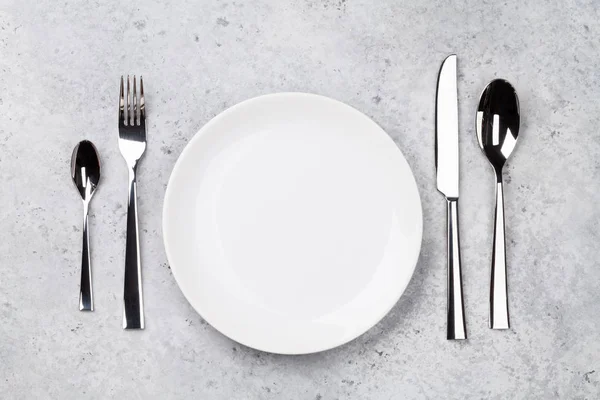 Table Setting Empty Plate Knife Fork Spoons Top View Flat — Stock Photo, Image