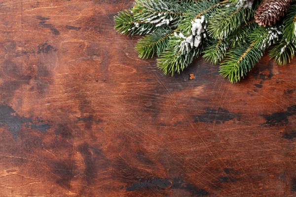Christmas Fir Tree Branch Covered Snow Wooden Background Top View — Stock Photo, Image