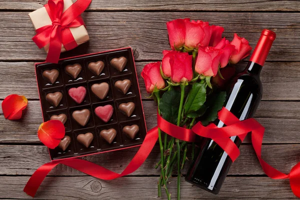Valentines Day Red Roses Wine Bottle Chocolate Box Wooden Table — Stock Photo, Image
