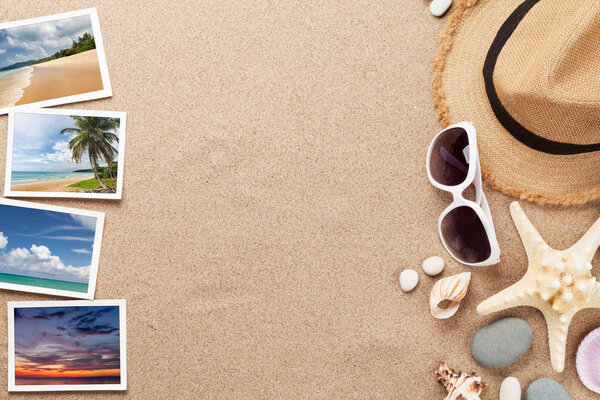 Travel vacation background concept with sunglasses, beach hat, seashells and photos on sand backdrop. Top view with copy space. Flat lay. All photos taken by me