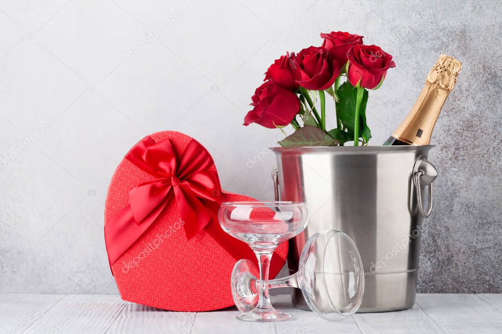 Valentine's day greeting card with champagne in bucket and rose flowers bouquet. With space for your greetings