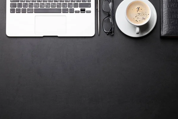 Office workplace table with laptop and coffee — Stock Photo, Image