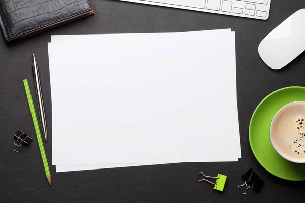 Office workplace table with blank paper page — Stock Photo, Image