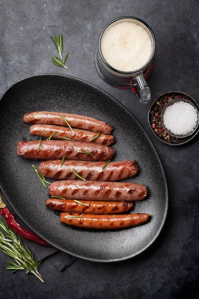 Grilled sausages and beer — Stock Photo, Image